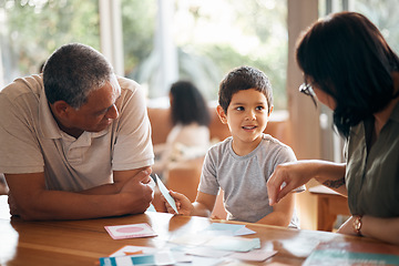 Image showing Home school, learning and parents support child with lesson and flash cards for education. Studying, kid and grandfather with teaching, communication and bonding from development and conversation