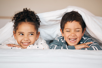 Image showing Siblings, morning and face of children in bed in blanket for bonding, love and fun together at home. Family, childhood and happy young boy and girl smile in bedroom for relaxing, resting and laying