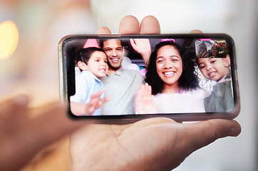 Image showing Video call, hand and phone screen with family to wave for birthday party at home with communication or hello. Smile, virtual chat and people together for online talk, celebration or social media