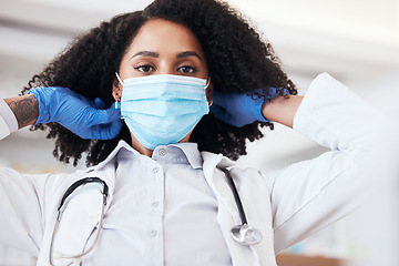 Image showing Doctor, woman and face mask for virus, bacteria and protection in medical exam, clinic or hospital. Healthcare worker, surgeon or nurse in portrait for covid 19 health, safety and medical compliance
