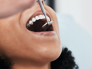 Image showing Mouth, teeth of woman and dentist with tools for dental cosmetics, healthcare assessment and test in clinic. Oral service, orthodontics and closeup of patient, mirror and excavator for tooth cleaning