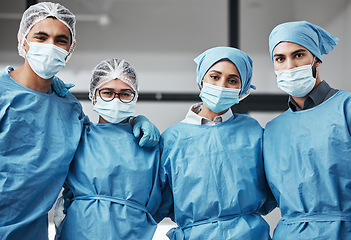 Image showing Support, portrait and doctors with face mask for surgery, healthcare and work in theater. Together, hospital and group of surgeons with a hug for medical collaboration, teamwork and cardiology