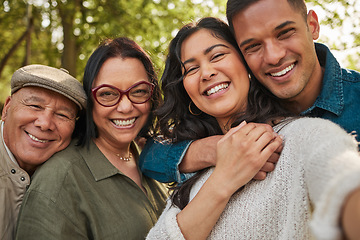 Image showing Happy family, parents and selfie by couple in a park together or people on vacation ans outdoor adventure. Smile, portrait and mother bonding with children and father in nature for summer travel