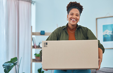 Image showing African woman, box and new house with moving, portrait and smile for fresh start, logistics and excited face. Girl, cardboard package and happy in living room, home and investing in real estate