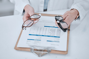 Image showing Clipboard, optometry and glasses for vision and eye care or wellness in an optical clinic. Checklist, medical and closeup of prescription spectacles with lens for optometrist or oculist treatment.