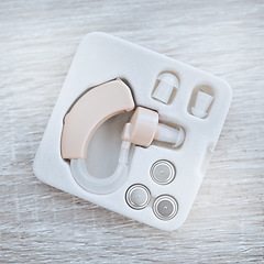 Image showing Hearing aid, healthcare and box for ear device with disability, medical equipment or sound. Audiology, deafness and technology for audio, wellness or medicine industry with modern listening accessory