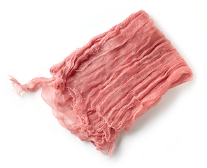 Image showing pink folded crumpled cotton napkin