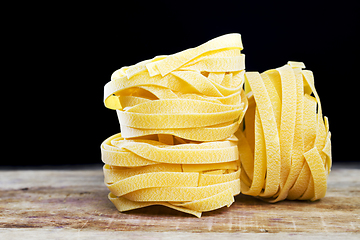 Image showing several twisted long pasta