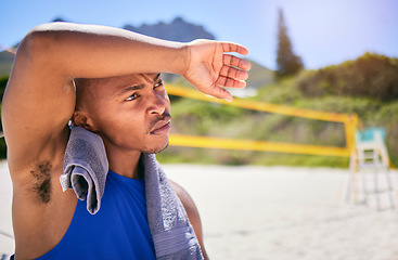 Image showing Tired man, volleyball and sports fitness on beach in match, game or intense outdoor competition in sun. Exhausted male person or player in sweat, break or rest after workout, exercise or training