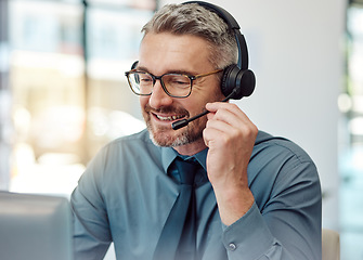 Image showing Senior, happy man and call center with headphones in customer service, support or telemarketing at office. Mature businessman, consultant or agent smile in online advice, help or contact us at desk