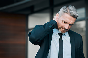 Image showing Tired, mature and a businessman with neck pain in the city from work stress, problem or accident. Sad, medical emergency and a ceo or manager with a muscle injury, frustrated or professional fatigue