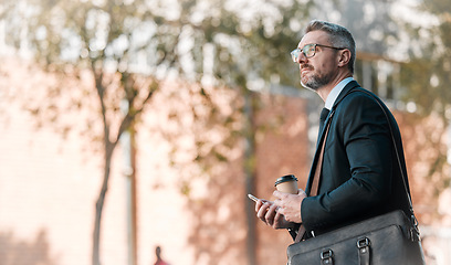 Image showing Mature business man, city and building, glasses and cellphone with coffee and bag in street on bokeh background. Entrepreneur, professional person and manager standing and wait for traffic outside