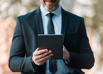 Image showing Outdoor, business and man with a tablet, closeup and connection with social media, typing and email notification. Person, broker or accountant with technology, city and online reading for information