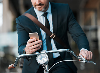 Image showing Businessman, phone in hands and bicycle outdoor for communication, travel and transportation. Entrepreneur person with a bike and smartphone for internet connection, carbon footprint and journey