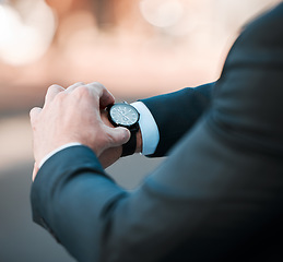 Image showing Businessman, watch and check time on clock for travel in city with a schedule, delay or entrepreneur planning morning appointment. Hands, checking and business hours of manager, employee or executive