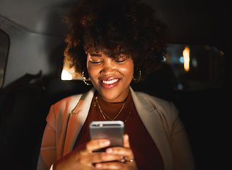 Image showing Black woman, afro and phone at night in taxi, travel or communication in social media or networking. Happy African female person smile in online chatting or late evening on mobile smartphone in car