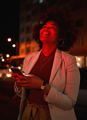 Image showing Thinking, woman and phone in city at night, typing and social media outdoor. Idea, smartphone and African person in street on internet, networking and happy smile on website app on neon light bokeh