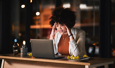 Image showing Business woman, stress and headache on computer of project proposal, report and planning, research or job deadline at night. Professional african person editing with pain, anxiety or tired on laptop