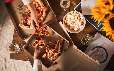 Image showing Food, pizza and hands, business meeting and wine with paperwork, people in team and dinner with top view. Popcorn, Italian cuisine meal and snack, eating and documents, collaboration and working