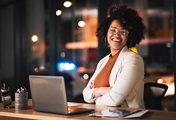 Image showing Business woman, portrait and arms crossed on computer for night planning, marketing research and online management. Professional african person or happy editor on laptop with career mindset and bokeh