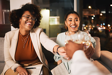 Image showing Black women, business people and night, wine and toast with celebration, deadline target or goals with happiness. Alcohol drink, party and winning, cheers and overtime with working late and meeting