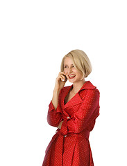 Image showing attractive young woman calling by cellular phone.