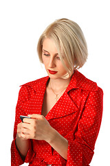 Image showing beautiful young woman reading message by phone