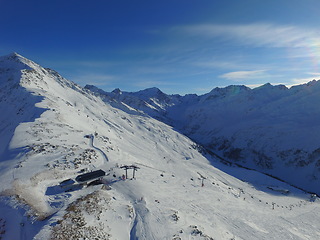 Image showing Mountain, snow and the Swiss Alps in winter for travel, holiday or vacation with a view of nature. Environment, landscape and adventure in a remote location during the cold weather season in Europe