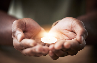 Image showing Prayer, candle or hands of man for worship, faith and belief for support, help and hope in Christian religion. Light, closeup or person in meditation for spiritual healing, mercy or trust for praise