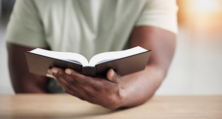 Image showing Bible, reading and hands with book and religion study at home for worship and spiritual support. Faith, christian knowledge and person with gratitude, scripture education and god guidance in a house