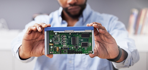 Image showing Circuit board, hands and technician with computer hardware, man in office with maintenance and electronics upgrade. Closeup, motherboard and CPU, engineering and electric repair with technology