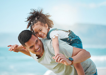 Image showing Piggy back, beach and father with girl, love and vacation with energy freedom and playful together. Happy family, dad carry female child and kid with seaside holiday, excited or travel with adventure