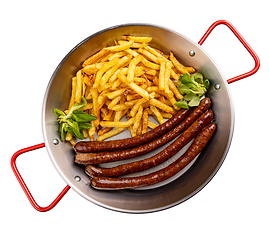 Image showing Grilled thin sausage served with French fries