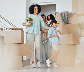 Image showing Kids, new home or parents moving boxes in real estate property investment or rental apartment. Mother helping, proud father or excited children carrying or walking by a box in family house together