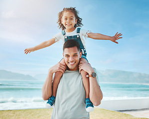 Image showing Piggy back, beach and father with girl, portrait and summer vacation with energy, adventure and playful together. Happy family, dad carrying child and kid with seaside holiday, happiness and travel