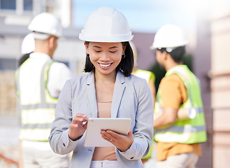 Image showing Tablet, woman in engineering and architect on construction site with building engineer group for team planning, inspection and property renovation. Smile, Asian person and project leader for repair