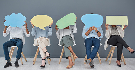 Image showing Social media, speech bubble and business people with a sign for opinion in a waiting room for an hr interview. Marketing, advertising or communication with men and woman in the office for recruitment