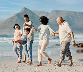 Image showing Love, children and a family walking on the beach together for summer vacation or holiday in nature. Sky, freedom or travel with grandparents, parents and kids outdoor for bonding by the ocean