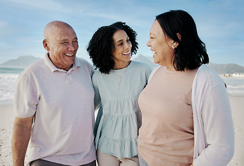 Image showing Happy family, beach and woman with senior parents hug, laugh and bond in nature together. Smile, love and laughing elderly couple with adult daughter at sea for retirement, travel and visit in Cuba