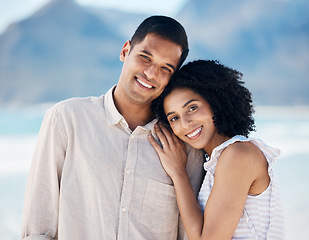 Image showing Happy, couple and portrait together on beach holiday, vacation or travel to Brazil for summer break at the ocean or sea. People, smile and love a tropical adventure for honeymoon trip or marriage