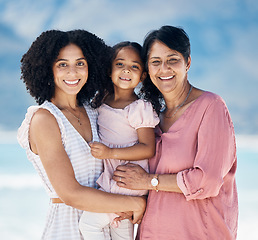 Image showing Mom, grandma and girl in beach portrait, smile and hug with care, love and generations on vacation in sunshine. Mature woman, happy mother and daughter for bonding, summer and holiday together by sea