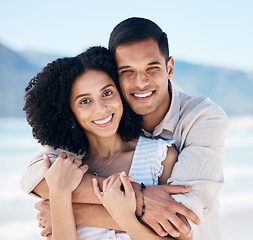 Image showing Happy, couple and portrait on beach in Brazil holiday, vacation or travel for summer break at the ocean, waves or sea. People, smile and love a tropical adventure together for honeymoon or marriage