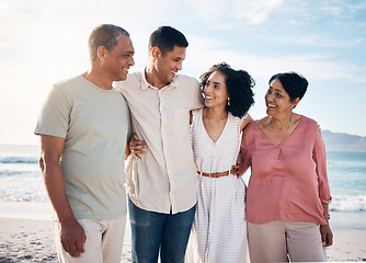 Image showing Ocean, senior parents with men and women together with smile, love and hug on summer holiday in Mexico. Embrace, happy family support and mature mom, dad and children on ocean holiday travel walk.