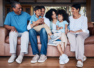 Image showing Happy, funny and relax with big family on sofa for smile, bonding and peace. Love, generations and grandparents with parents and children in living room at home for vacation, cuddle and embrace