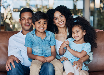 Image showing Happy, portrait and relax with family on sofa for smile, bonding and peace on holiday. Love, care and happiness with parents and children in living room at home for vacation, cuddle and embrace