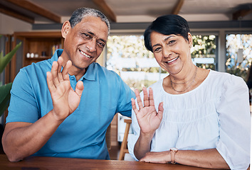 Image showing Video call, wave and portrait of senior couple with communication in the dining room at home. Happy, smile and elderly man and woman in retirement greeting for an online virtual conversation together