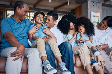 Image showing Laughing, big family and on a home sofa for conversation, visit or bonding. Happy, together and parents, children and grandparents on a couch for a joke, comedy or communication in the living room