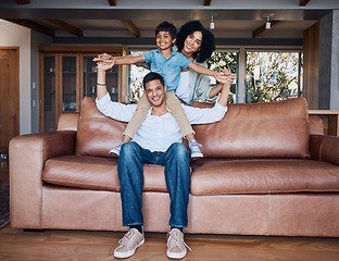 Image showing Happy, airplane and portrait with family on sofa for smile, bonding and peace on holiday. Love, care and happiness with parents and child in living room at home for vacation, cuddle and embrace