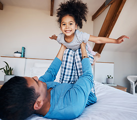 Image showing Portrait, airplane and smile of girl child with father in bedroom flying for fantasy, happiness, and fun in modern apartment. Face, love and man lifting young kid on knee in family home for play