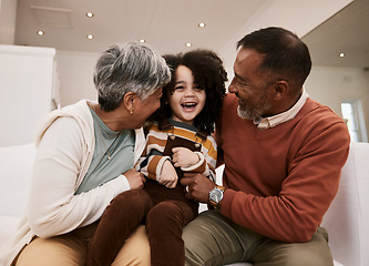 Image showing Grandparents love, laugh and happy family child, grandma and grandfather excited, having home fun and babysitting grandchild. Comedy humour, grandfather and grandmother play with kid on lounge sofa